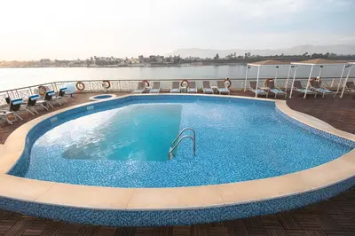 a swimming pool on the deck of a cruise ship at Orient Grand Rose Nile Cruise - Every Saturday from Luxor for 07 & 04 Nights - Every Wednesday From Aswan for 03 Nights in Luxor