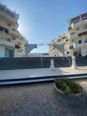 a large amphitheater in front of a building at Tiba view Hurghada in El Gouna