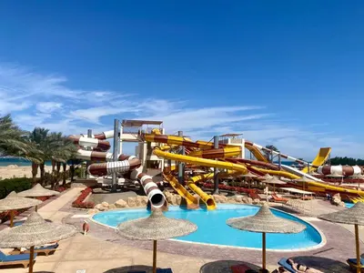 a water park with a water slide and a pool at Apartment in el karma aqua beach resort hurghada near el gouna 3 in Hurghada