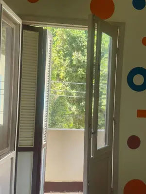 an open door with a view of a window at SEO House in Aswan