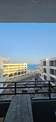 a view from the balcony of a building with the ocean at Hurghada seaview apartment in Hurghada