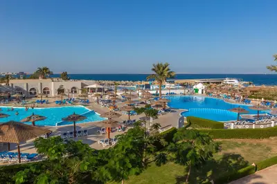 an aerial view of a resort with a swimming pool at Aladdin Beach Resort in Hurghada