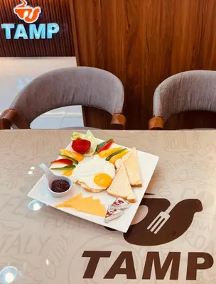 a plate of food on top of a table at Scandic sea view in Hurghada
