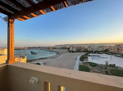 a view of a swimming pool from a balcony at Luxury Stays in Waterside El Gouna in Hurghada
