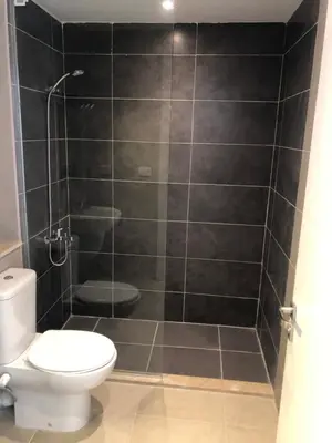 a bathroom with a toilet and a shower at G cribs B15 in Hurghada