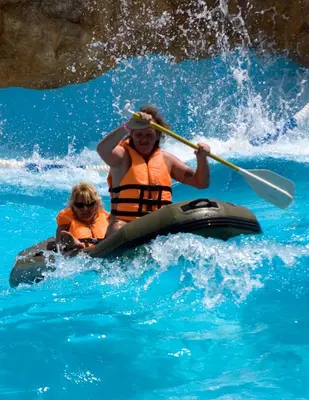 two people in a kayak in the water at Titanic Aqua Park Resort - Families and Couples only in Hurghada