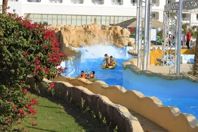 a group of people in a water slide at a theme park at Titanic Aqua Park Resort - Families and Couples only in Hurghada