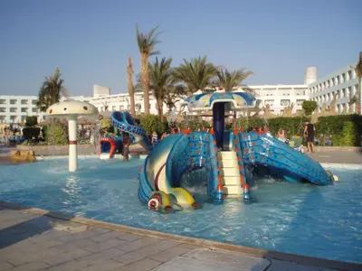 a water park with a water slide in the water at Titanic Aqua Park Resort - Families and Couples only in Hurghada