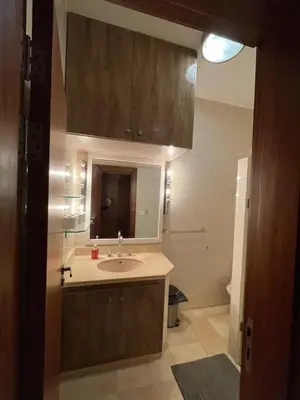 a bathroom with a sink and a mirror at Apartment for rent in ElGouna in Hurghada