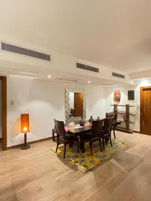 a dining room with a table and chairs at Apartment for rent in ElGouna in Hurghada