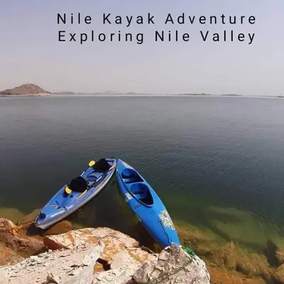 a blue kayak sitting on top of the water at Nile Kaiak Adventure in Aswan