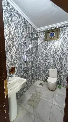 a bathroom with a sink and a toilet at Aswan apartment-Center of Aswan in Aswan
