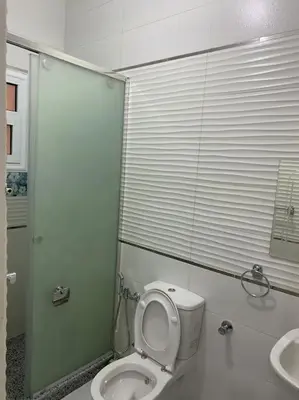 a bathroom with a toilet and a sink at Steven in Luxor