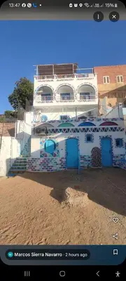 a picture of a building with blue doors at PANORAMIC BABA DOoL in Aswan