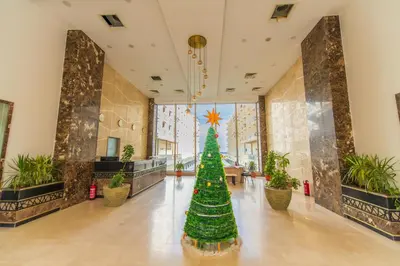 a christmas tree in the middle of a lobby at scandic resort 523 in Hurghada