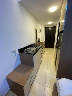 a kitchen with a counter top in a room at Florenza Resort- Hurghada in Hurghada