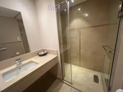 a bathroom with a sink and a shower at SunShine Mangrove in Hurghada