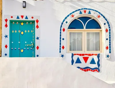 a building with two doors and a window at JAREEDY Guest house in Shellal
