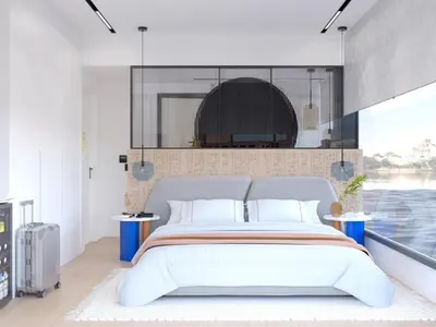 a bedroom with a large bed and a large window at Nefertem Yacht, All-Inclusive Boutique Charter in Luxor