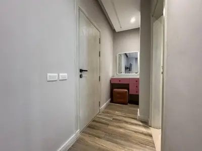 a hallway with a bathroom with a door and a mirror at Luxury Villa Hurghada Pool Near Senzo Mall 3story in Hurghada