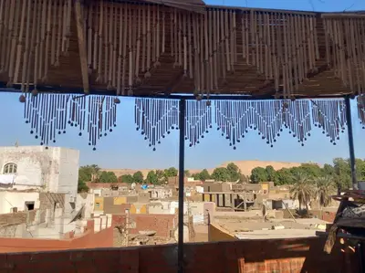 a view of a city from a window at Hashem Nubian Guest House in Aswan