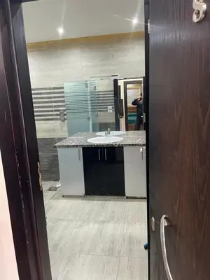 a bathroom with a sink and a mirror at hotel mirage aqua park in Hurghada