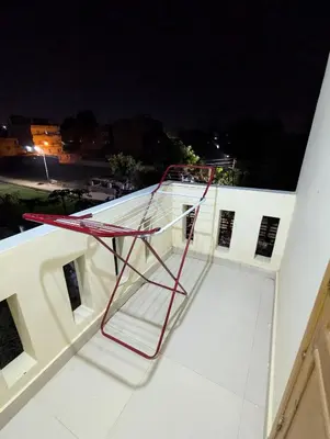 a staircase on the roof of a building at night at Pharaohs Apartments in Luxor