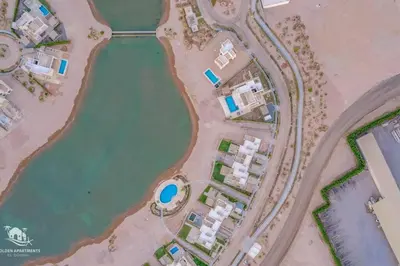 an aerial view of a resort on a beach at Charming 2-Lvl 3BR Lagoon Home in Shedwan El Gouna, Pool Access in Hurghada