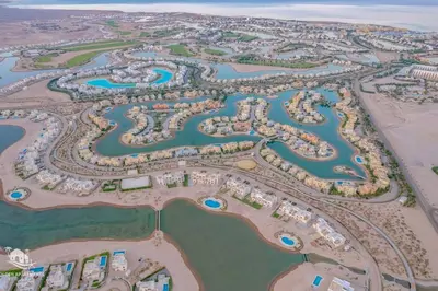 an aerial view of a resort complex at Charming 2-Lvl 3BR Lagoon Home in Shedwan El Gouna, Pool Access in Hurghada