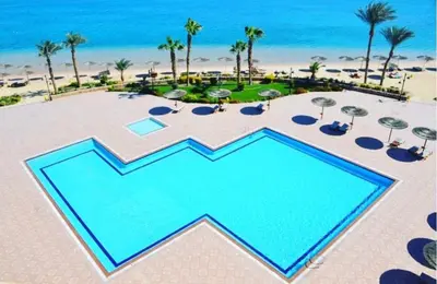 an overhead view of a pool at the beach at Esplanada hotel Apartments in Hurghada