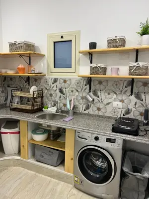 a laundry room with a washer and dryer at Villa Muhammad in Quseir