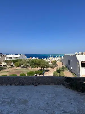 a view of the ocean from the balcony of a house at Mastaba Village Hurgada House in Hurghada