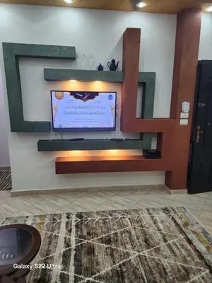 a wall with a tv on a wall at Abeer Suites 5 in Hurghada