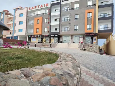 a building with a stone path in front of it at Capitan house beside Bellagio hotel 5 minutes from El gouna in Hurghada
