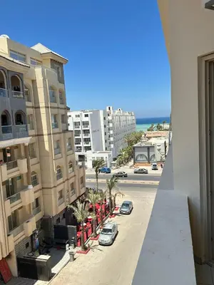 a view of a street from a balcony of a building at Downtown Keys in Hurghada