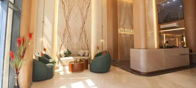 a lobby with couches and chairs in a building at Tiba Golden beach resort hurghada down town in Hurghada