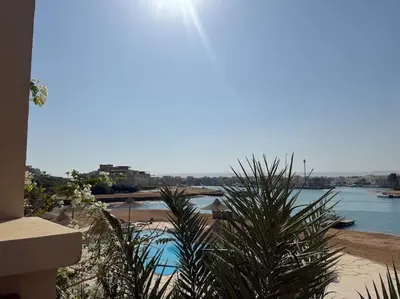 a view of a body of water from a building at The Charming Beachfront Retreat in Fanadir in Hurghada