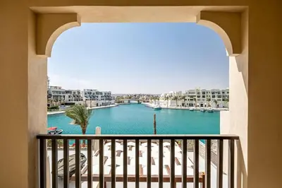 a view of a river from a balcony at Freshly Minted: 1BR Fanadir Marina in Hurghada