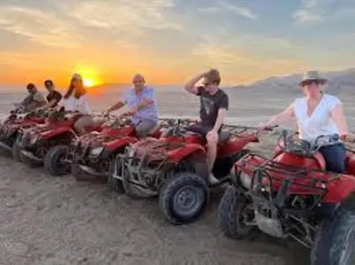 a group of people sitting on atvs on the beach at Osiris Hotel Luxor \u60a8\u5728\u76e7\u514b\u7d22\u7684\u7b2c\u4e8c\u500b\u5bb6 in Luxor