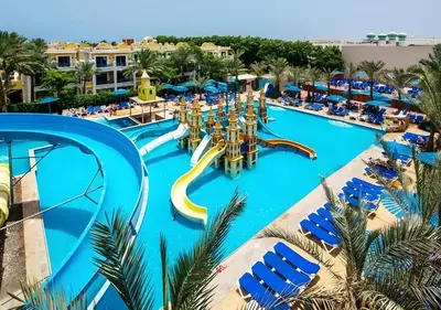 an image of a resort pool with slides at HRG Hurghada Hotel Apartments Aqua park - By MAMO Property in Hurghada