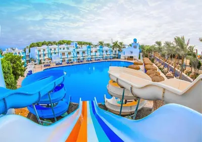 a view of a water slide at a resort at HRG Hurghada Hotel Apartments Aqua park - By MAMO Property in Hurghada