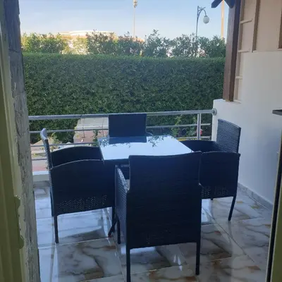 a table and chairs on a balcony with a view at Cecelia Beach Resort - 2 Rooms with terace in Hurghada