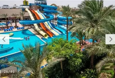 a water slide at a resort with a water park at ميراج in Hurghada