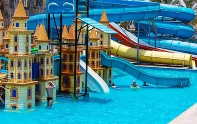 a water park with a water slide and slides at ميراج باي in Hurghada