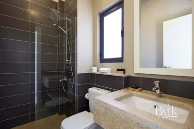 a bathroom with a sink and a toilet and a shower at BYTK - Villa La Calma in Hurghada