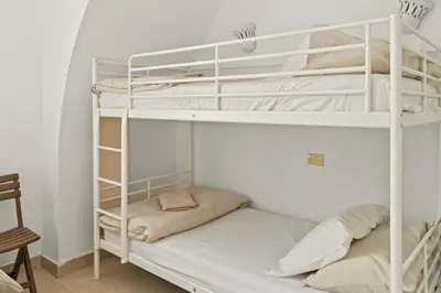 a couple of bunk beds in a room at The Downtown Getaway Studio in Hurghada