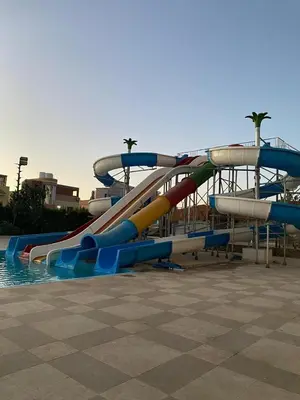 a water slide in a water park at Fanader bay sea view apartment in Hurghada