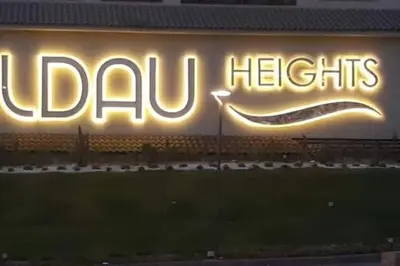 a sign that says ulu lights on the side of a building at Family apartment Aldau Heights in Hurghada