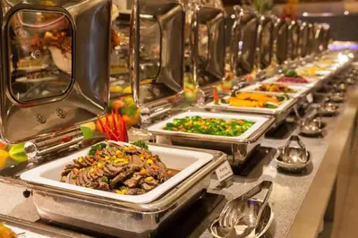 a buffet line with many different dishes of food at Nile Cruise 3 nights From Aswan to Luxor in Aswan