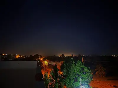 a view of a city at night at MAGIC GUEST HOUSE - Δ Relax Pur Δ 15 MiN TO ASWAN in Aswan